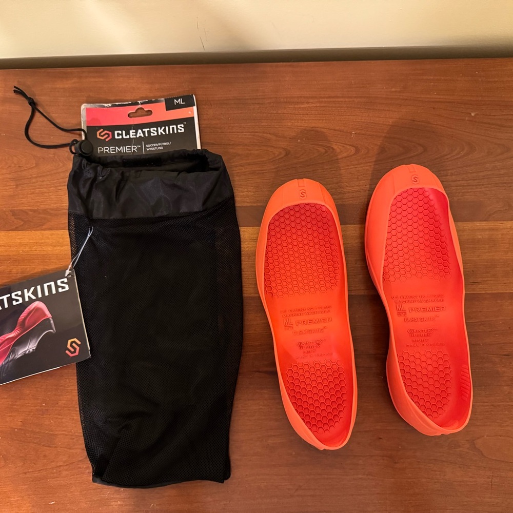 Cleatskins Orange - Size M/L excellent used condition EUC